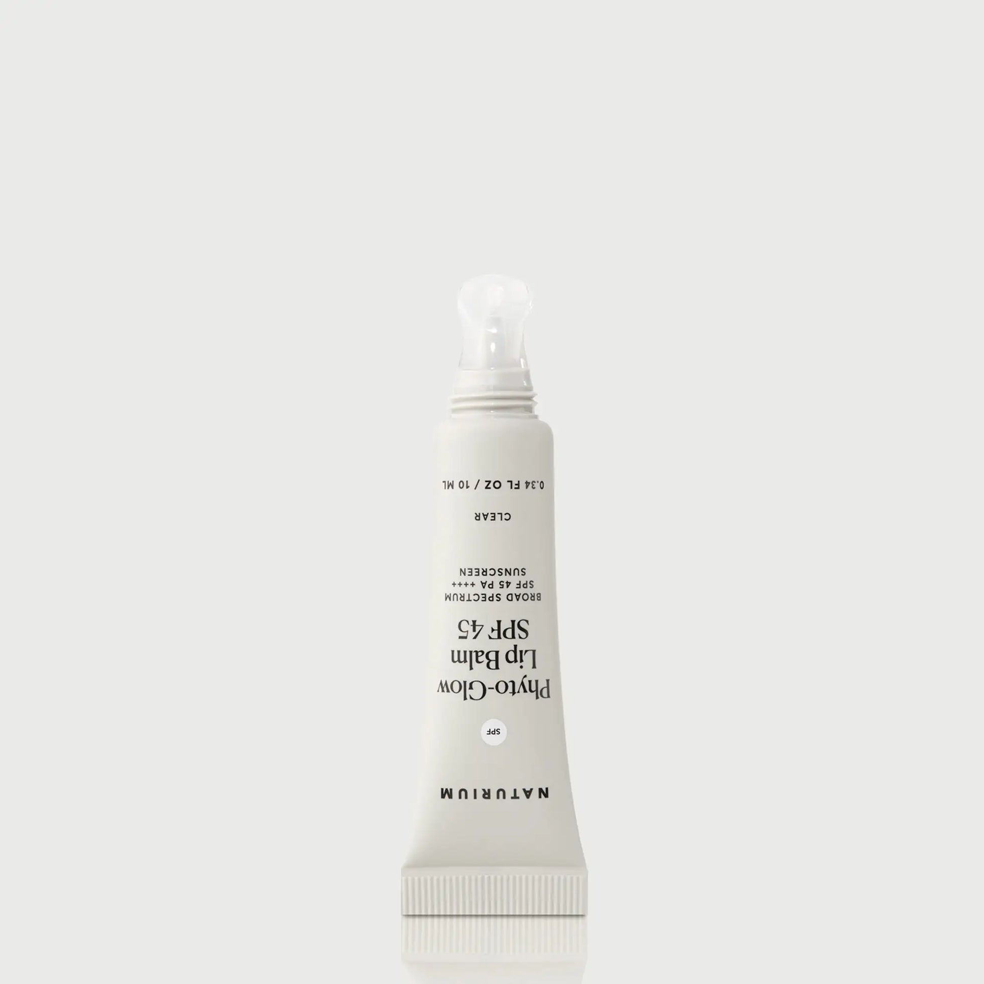 phyto-glow-lip-balm-spf-45-clear-z6 NATR-10124_PhytoGlow_SPF_Clear_primary_nocap_bonebkgd_1.webp
