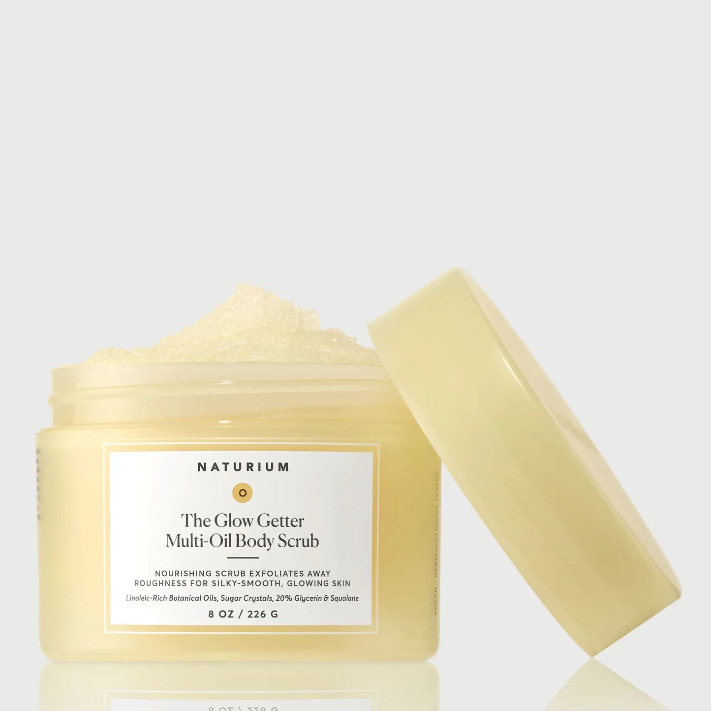 the-glow-getter-multi-oil-body-scrub-b4 NATR-40028-GlowGetter-Multi-Oil-Body-Scrub-Front-CapOff-bonebkgd.webp