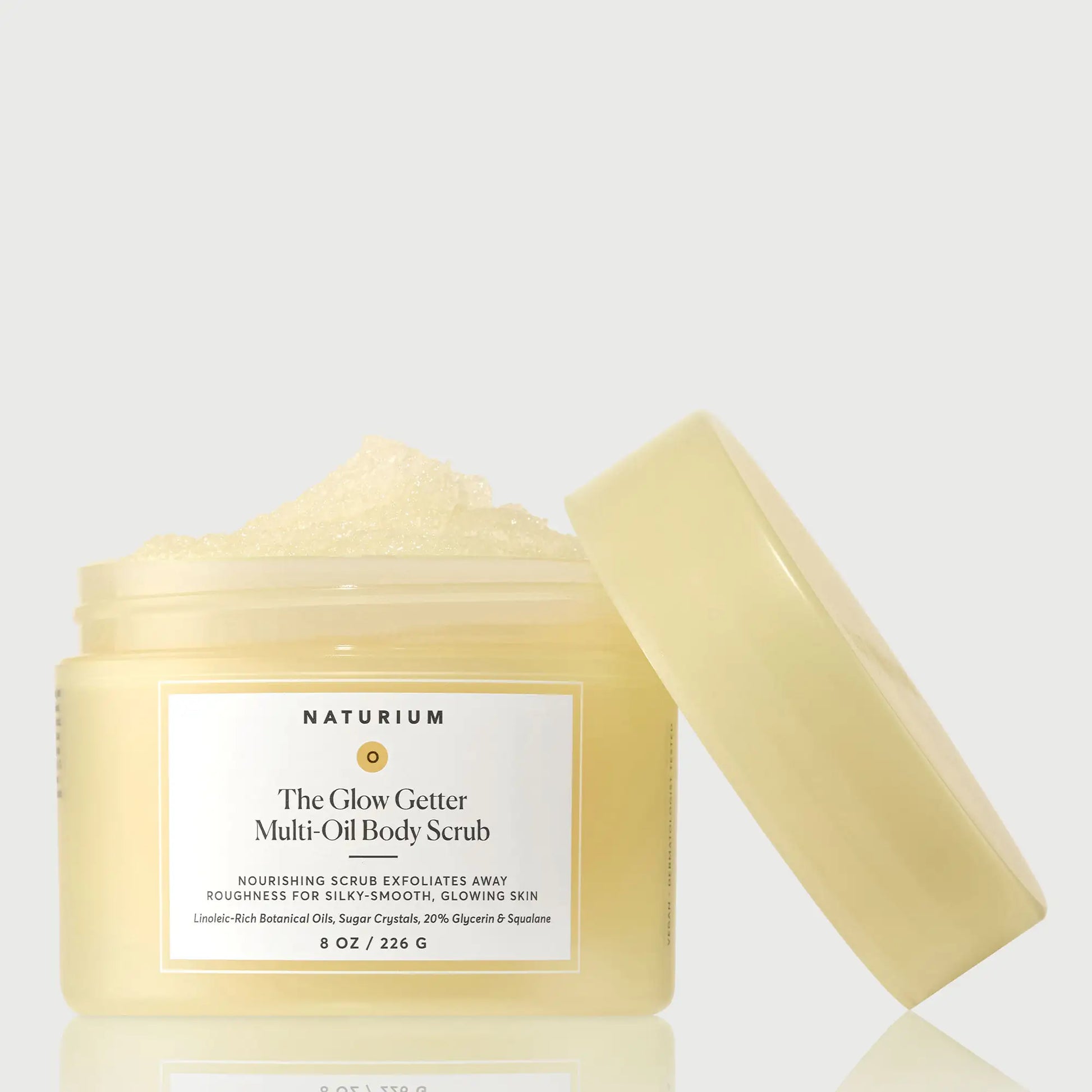 the-glow-getter-multi-oil-body-scrub-b4 NATR-40028-GlowGetter-Multi-Oil-Body-Scrub-Front-CapOff-bonebkgd.webp