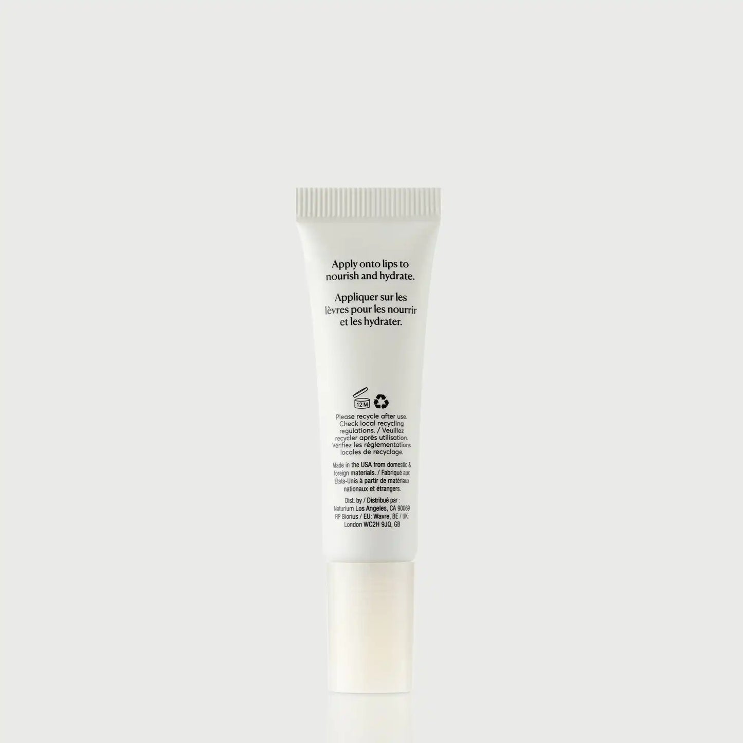 phyto-glow-lip-balm-clear-a1 NATR-60066_PhytoGlow_Clear_primary_capon_back-bonebkgd.webp